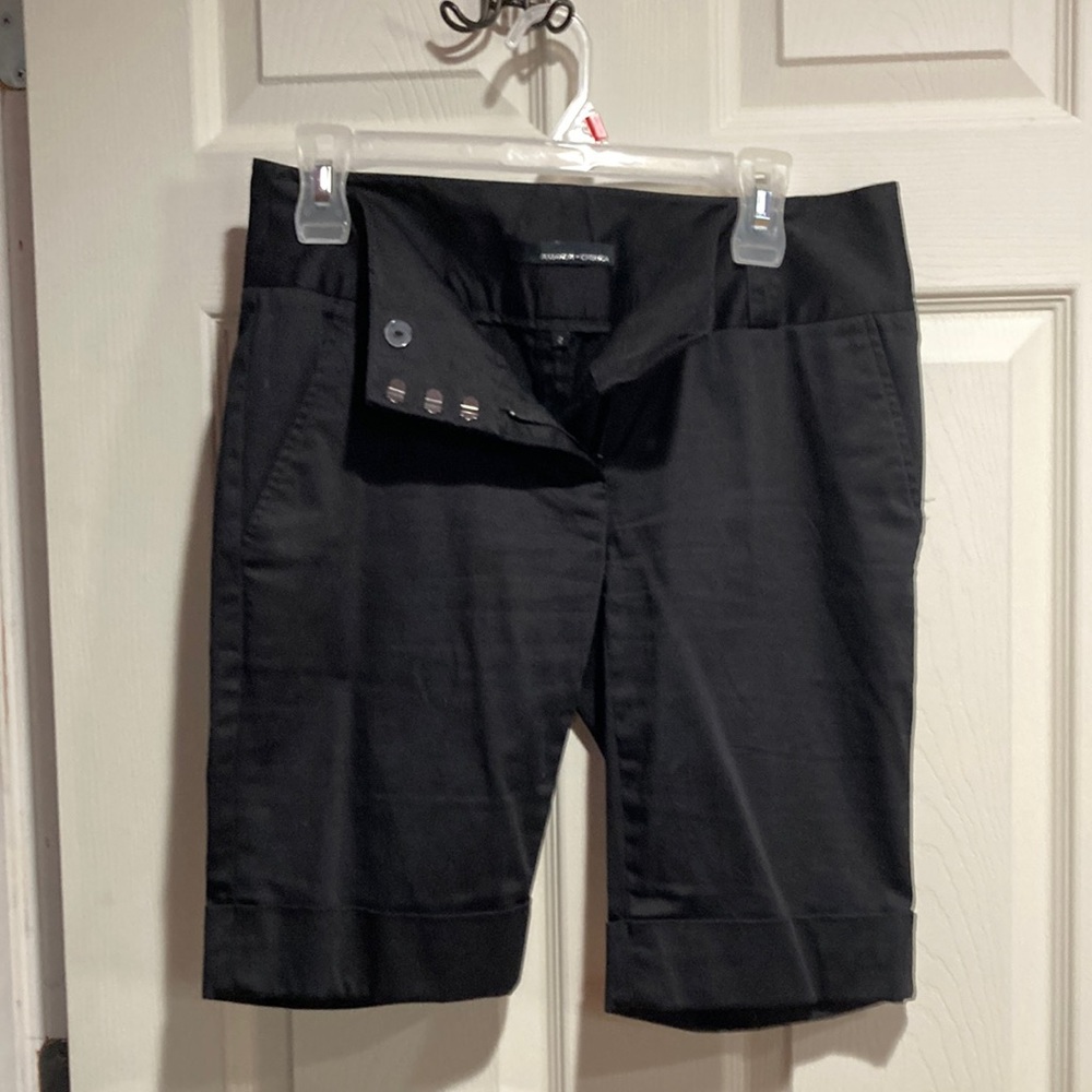 Amanda Chelsea size two dress up long shorts.  Cuffs on the legs. Shirt zipper.